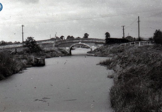 048638E (146 visits) Image credit: RCHS. 1964, "Junction basin with Kennet & Avon Canal at Semington. Sunken boat with wo... 048638E