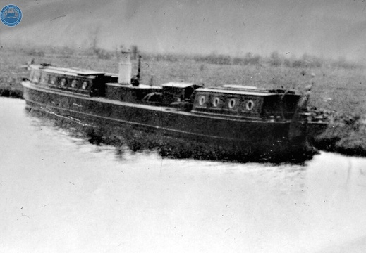 074657E